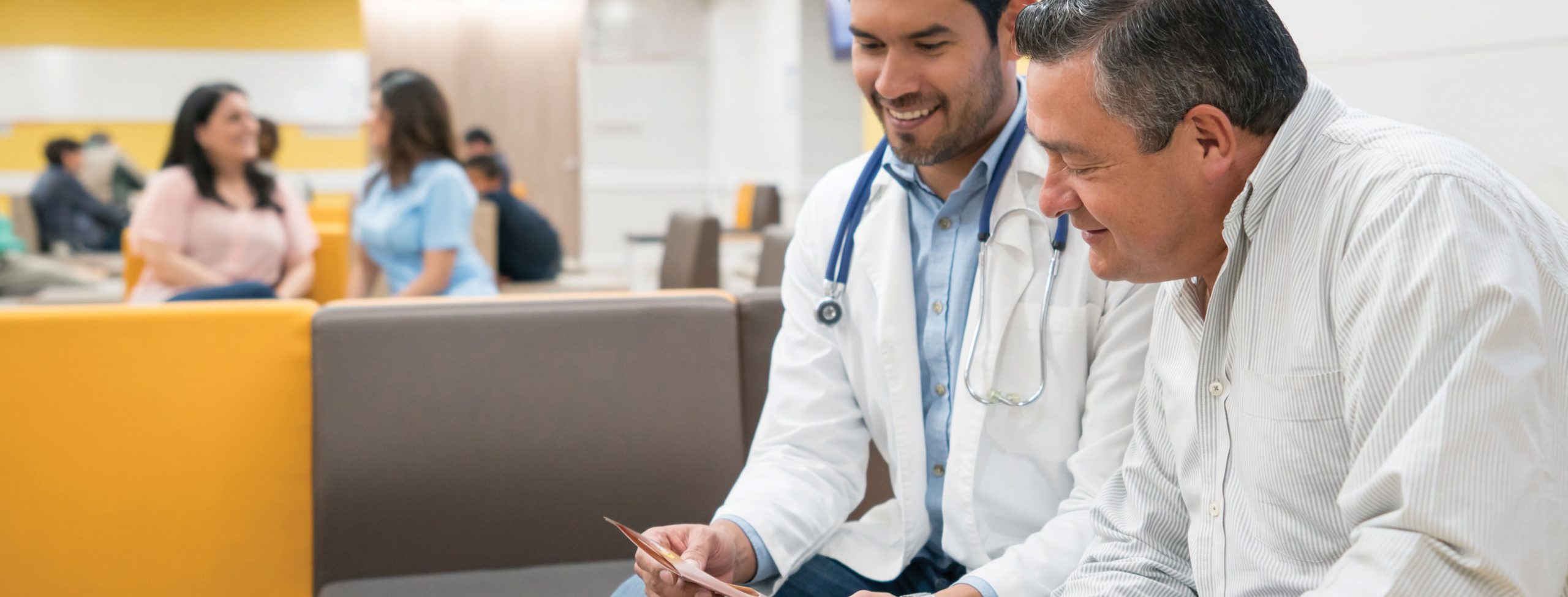 Doctor-consult_Latino_960073158 Doctor Consult with BPH patients in Lakeland, FL - prostate artery embolization (PAE)